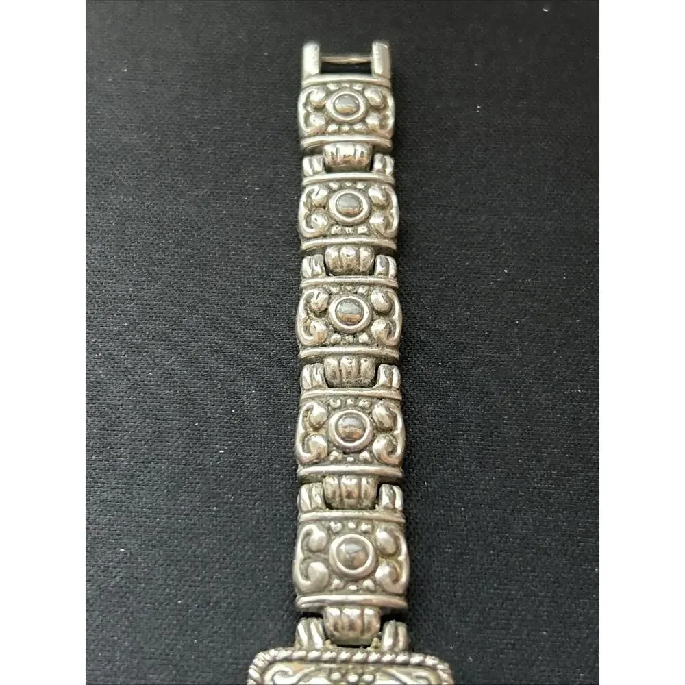 Attitude silver tone
